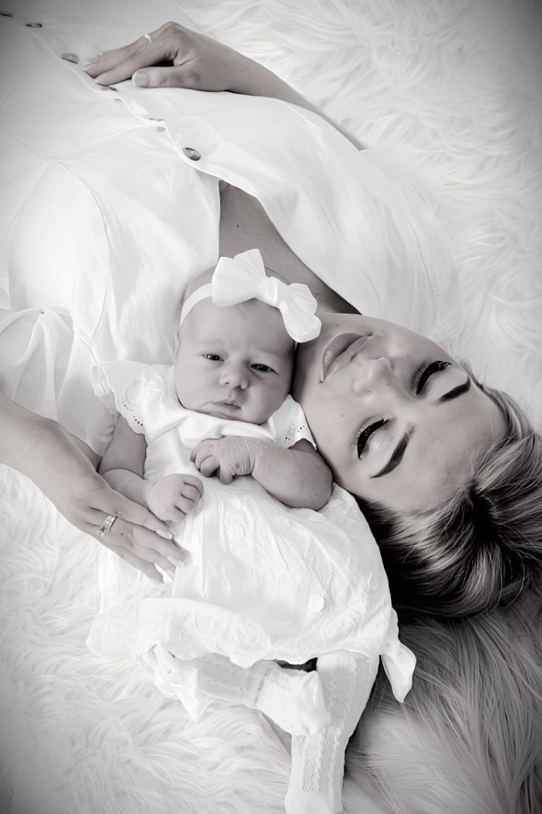 New mother and baby girl New mother and newborn baby photographed in Bilston